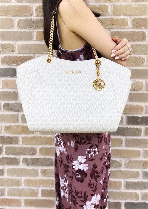michael kors jet set travel large ivory totes outlet